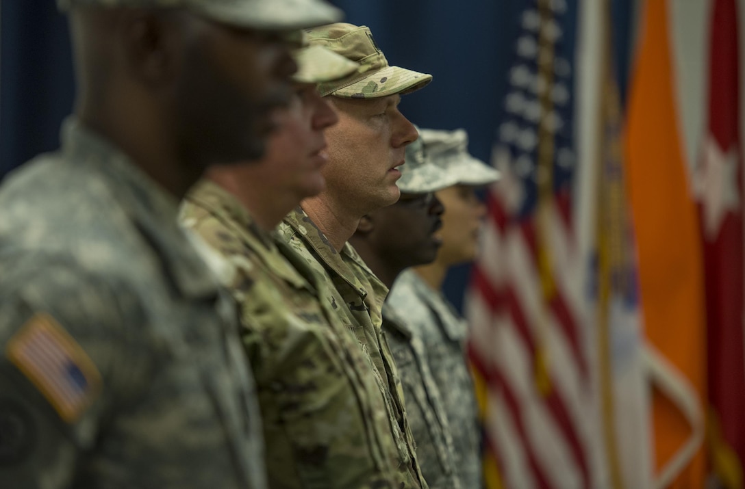 U.S. Army Reserve Soldiers wth Detachment 6, 335th Signal Command (Theater), sing the Army Song during their deployment ceremony at the command headquarters in East Point, Ga., Feb. 12, 2017. The detachment left for a nine-month mission in the Middle East after the ceremony. 