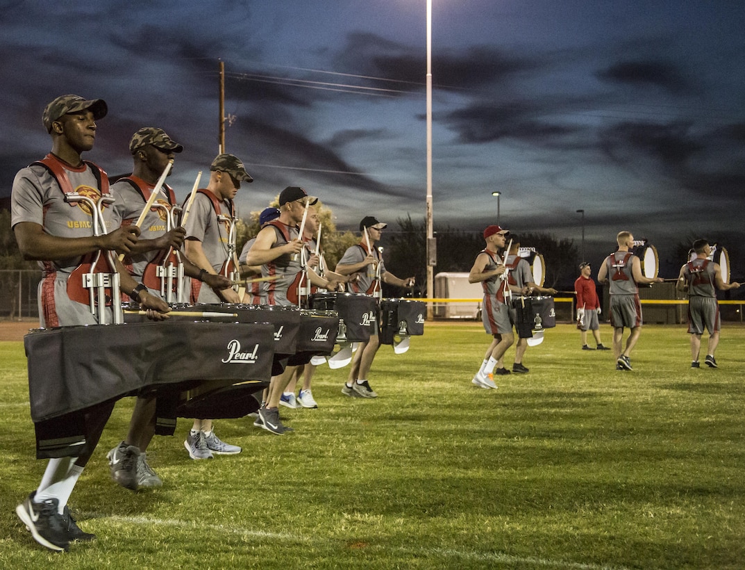 The U.S. Marine Drum & Bugle Corps practices music in motion during a portion of their month-long training phase as a part of the Marine Corps Battle Color Detachment aboard Marine Corps Air Station Yuma, Az., Feb. 8, 2017. The BCD is comprised of the U.S. Marine Corps Silent Drill Platoon, “The Commandant’s Own,” the U.S. Marine Drum & Bugle Corps and the U.S. Marine Corps Color Guard. This highly skilled unit travels across the country to demonstrate the discipline, professionalism, and “Esprit de Corps” of United States Marines. (Official Marine Corps photo by Cpl. Robert Knapp/Released)