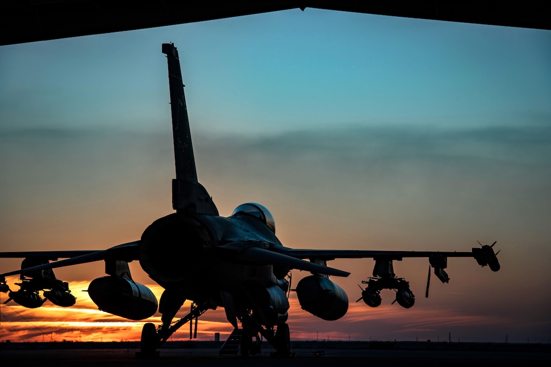 An F-16 Fighting Falcons aircraft sits on the flightline at sunset in Southwest Asia, Feb. 6, 2017. The F-16 aircraft is assigned to the 134th Expeditionary Fighter Squadron. Air Force photo by Master Sgt. Benjamin Wilson