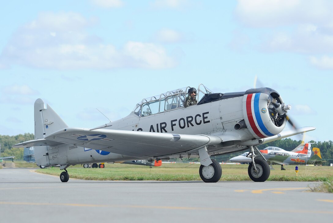 Mike Halem is shown in his T-6 Texan which wears U.S. Air Force training markings in Easton, Md., Sept. 29, 2013. (Photo by Greg L. Davis)
