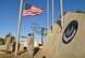 Military members of the Oklahoma City Air Logistics Complex lower the American flag from the base flag pole during an official retreat ceremony Jan. 24, 2017, Tinker Air Force Base Oklahoma. OC-ALC  conducted the retreat ceremony as part of the official Tinker AFB 75th Anniversary events. Tinker hosts the Air Force Sustainment Center and falls under the Air Force Materiel Command. The AFMC badge is displayed on the wall.  (U.S. Air Force photo/Greg L. Davis)