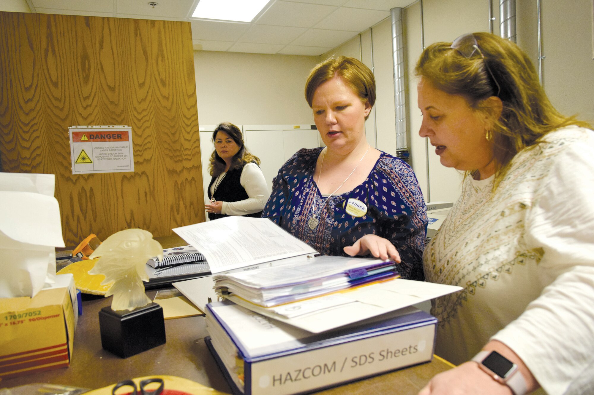 Rose Meyer, left, 72nd Force Support Squadron, Tinker Air Force Base Arts and Craft Center director, shows Kelly Hyatt, a Voluntary Protection Program inspector, data sheets for chemicals used within the facility during an inspection to ensure the workplace meets Occupational Safety and Health Administration standards Feb. 8, 2017, Tinker Air Force Base, Okla. VPP inspections and analysis are on-going throughout the 72nd Air Base Wing this week. (U.S. Air Force photo/Greg L. Davis)