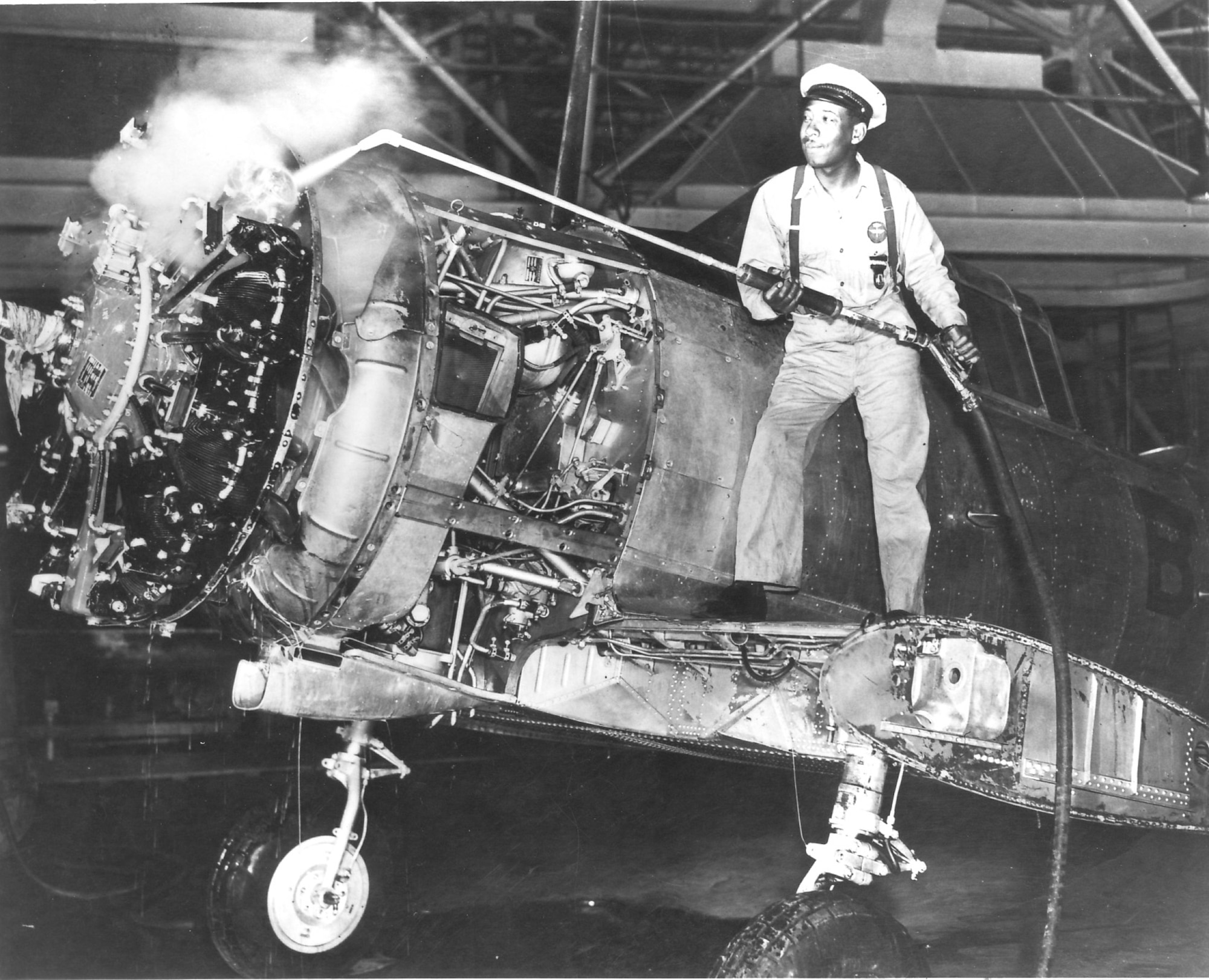 AT-6 engine steam cleaning at Tinker. (Photo courtesy of Tinker History Office)