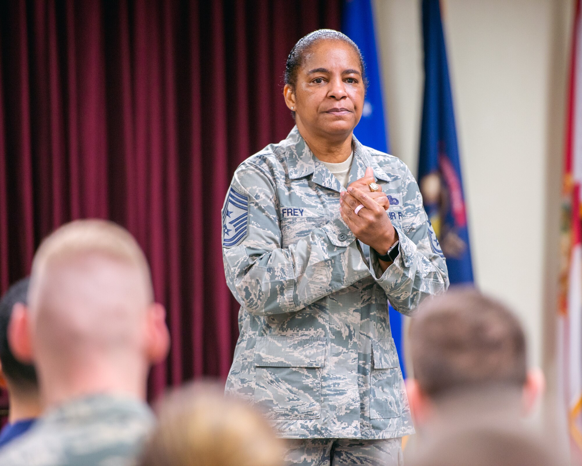 U.S. Air Force Chief Master Sgt. Shelina Frey, Air Mobility Command command chief, Scott Air Force Base Ill., speaks to an Airmen Leadership School class during her tour of Travis Air Force Base, Calif., Feb. 8, 2016. Frey is on a five-day tour to Travis visiting with Airmen, observing operations and recognizing the newest chief master sergeants. (U.S. Air Force photo/Louis Briscese)