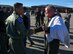 Former 315th Airlift Wing Vice Commander, Maj. Gen. Michael Kim, mobilization assistant to the Air Force Reserve Command commander, congratulations retiring Lt. Col. Rick Davis, 317th Airlift Squadron, after Davis' 