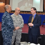Ed Dolanski, right, president, Global Services and Support, Boeing Corporation, speaks with Defense Logistics Agency Aviation Navy Customer Facing Division Chief Cmdr. Mark Harris, far left, DLA Aviation Commander Air Force Brig. Gen. Allan Day, second from left, during a break at the activity’s Senior Leader Conference.  Dolanski provided attendees with the supply chain perspective from the aviation industry point-of-view.  The conference was held Feb. 7-9, 2017 on Defense Supply Center Richmond, Virginia. 