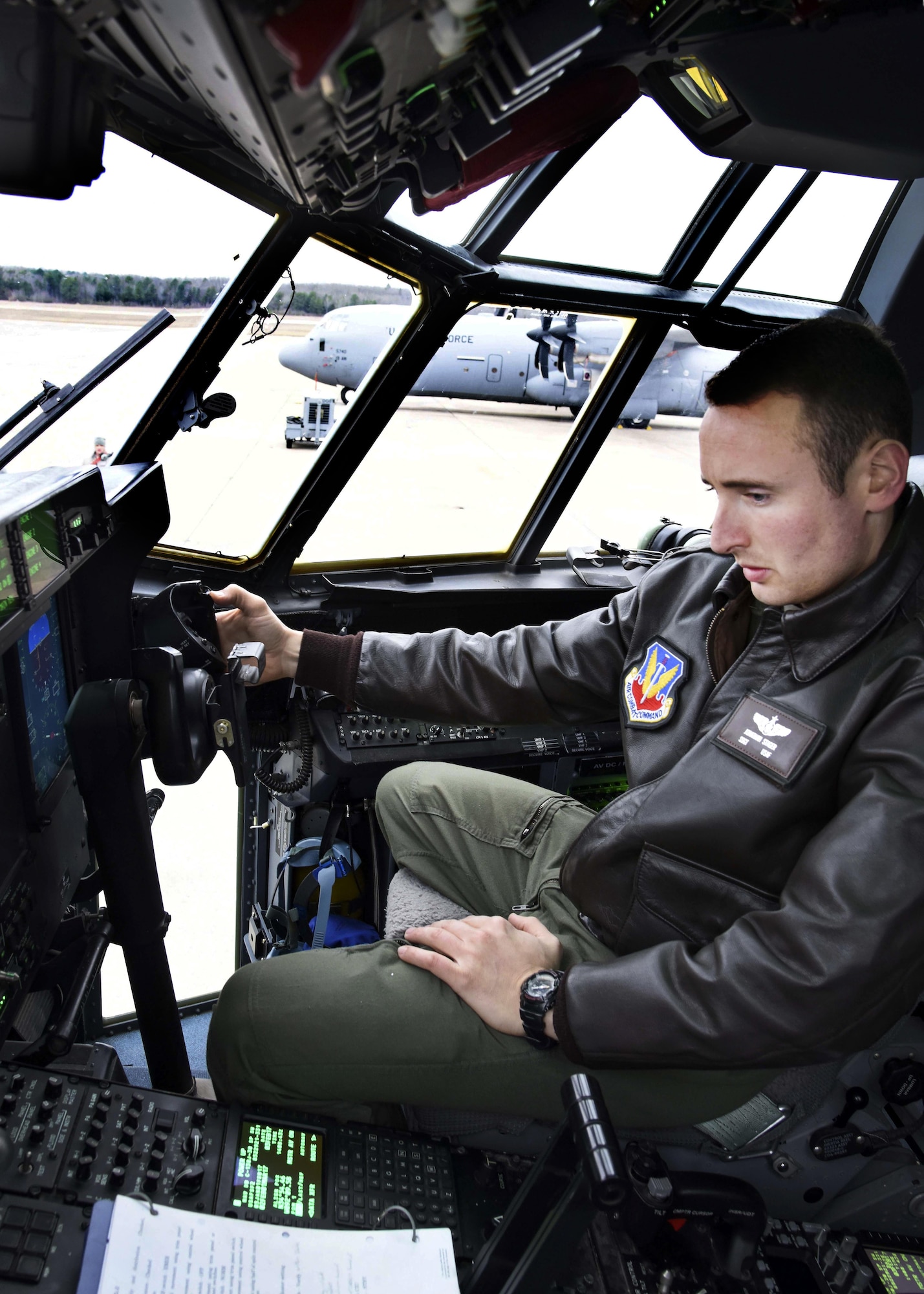 U.S. Air Force Staff Sgt. Jonathan Stager, 29th Weapons Squadron instructor loadmaster, checks the flight controls during a pre-flight inspection Feb. 3, 2017, at Little Rock Air Force Base, Ark. Pre-flight inspections ensure the different aircraft systems operate properly. (U.S. Air Force photo by Senior Airman Stephanie Serrano)