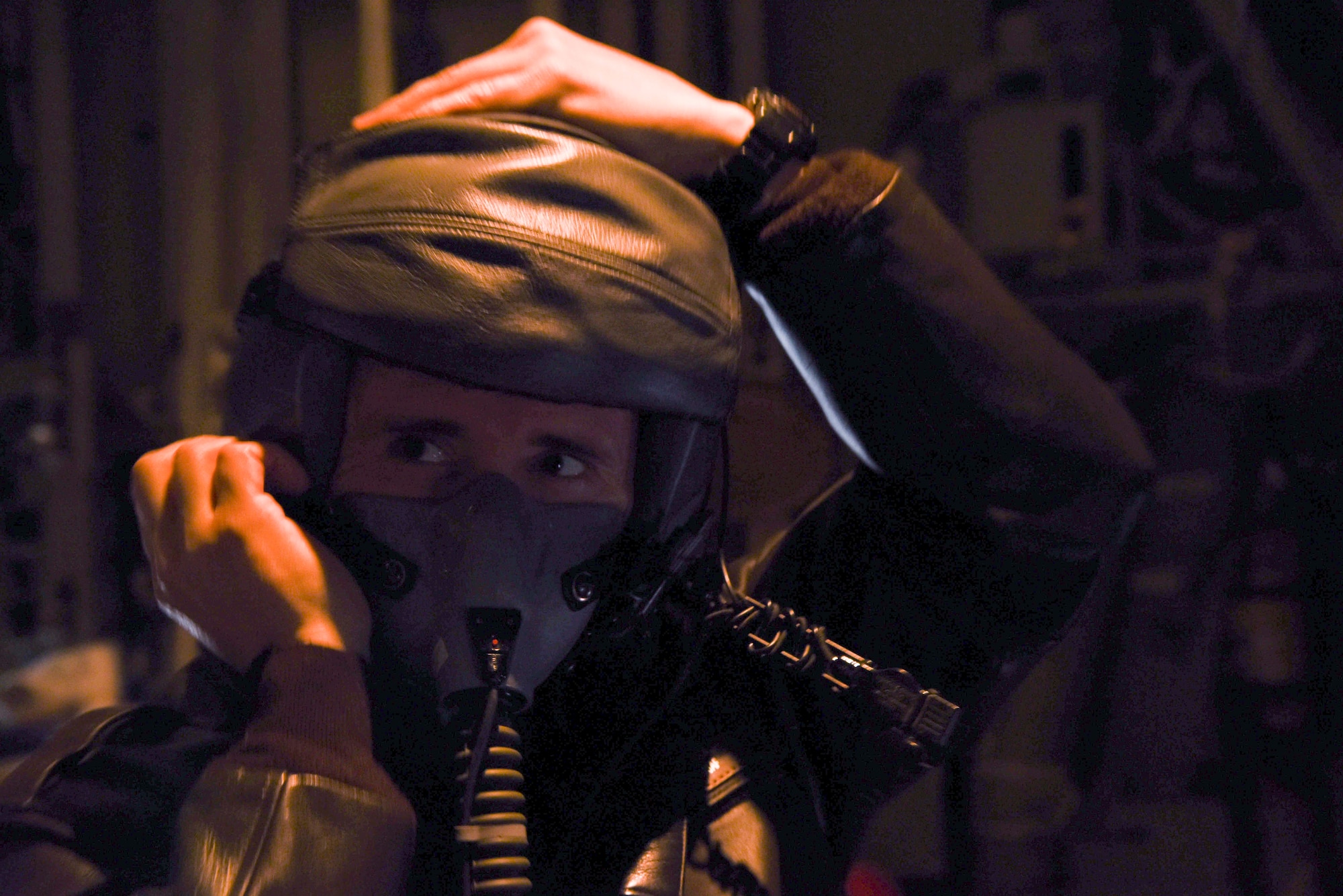 U.S. Air Force Staff Sgt. Jonathan Stager, 29th Weapons Squadron instructor loadmaster, checks his oxygen mask and communication system during pre-flight procedures Feb. 3, 2017, at Little Rock Air Force Base, Ark. Inspecting an oxygen mask ensures that in the event of an emergency, oxygen is readily available. (U.S. Air Force photo by Senior Airman Stephanie Serrano)