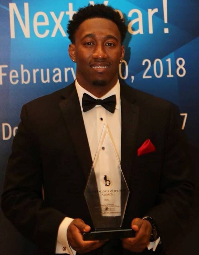 WASHINGTON (Feb. 11, 2017) - Dwayne Nelson, Naval Surface Warfare Center Dahlgren Division engineer, holds his Black Engineer of the Year (BEYA) Award after being honored for his community service accomplishments at the 31st annual BEYA gala. "This award has inspired and challenged me to contribute more towards empowering our youth and others to serve our community while encouraging interest in highly-rewarding science, technology, engineering and mathematics (STEM) fields," said Nelson. "Giving back and empowering people to reach their full potential is vital to stimulating enthusiasm about STEM. Every step, no matter how large or small, helps strengthen the arduous efforts in sustaining monumental, long-term, positive change within our communities." (U.S. Navy photo/Released)

