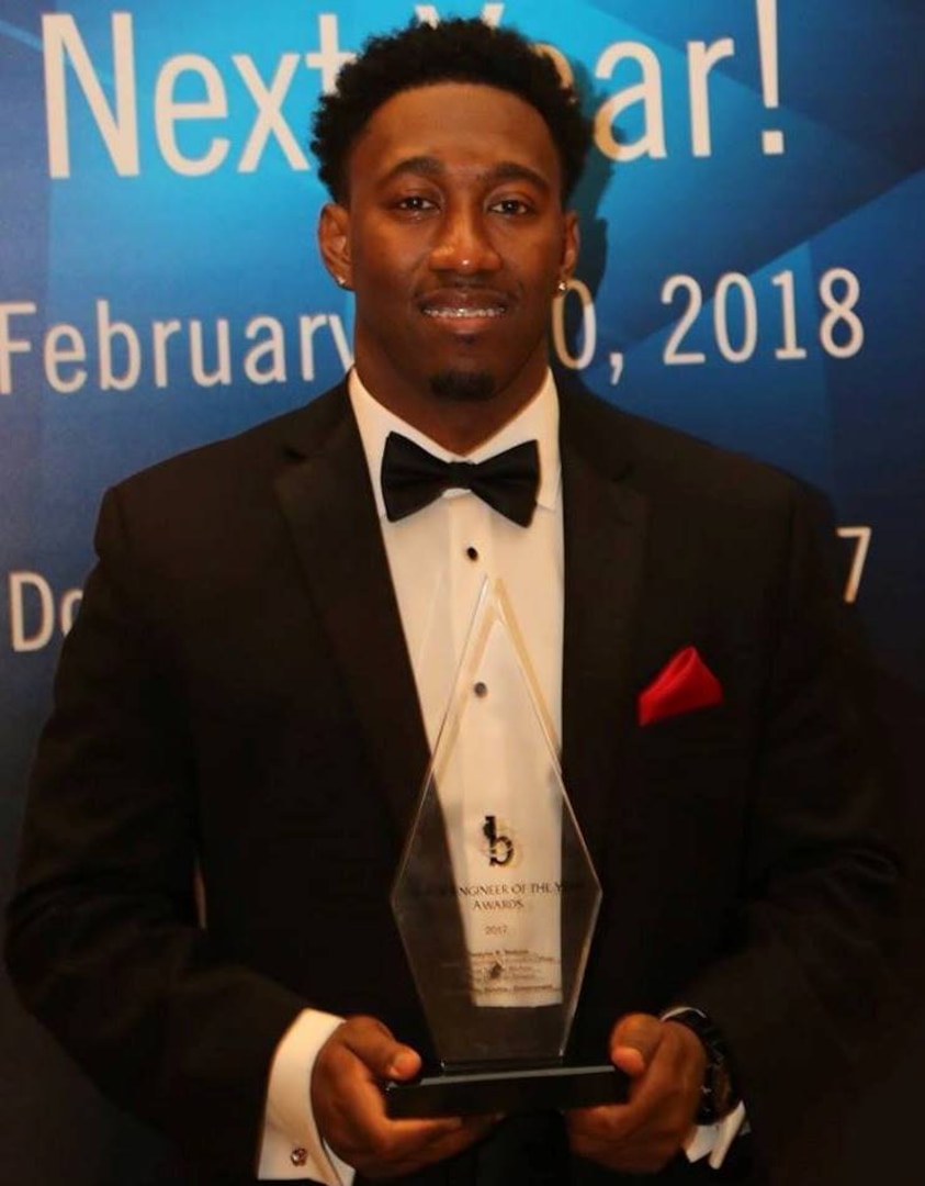 WASHINGTON (Feb. 11, 2017) - Dwayne Nelson, Naval Surface Warfare Center Dahlgren Division engineer, holds his Black Engineer of the Year (BEYA) Award after being honored for his community service accomplishments at the 31st annual BEYA gala. "This award has inspired and challenged me to contribute more towards empowering our youth and others to serve our community while encouraging interest in highly-rewarding science, technology, engineering and mathematics (STEM) fields," said Nelson. "Giving back and empowering people to reach their full potential is vital to stimulating enthusiasm about STEM. Every step, no matter how large or small, helps strengthen the arduous efforts in sustaining monumental, long-term, positive change within our communities." (U.S. Navy photo/Released)

