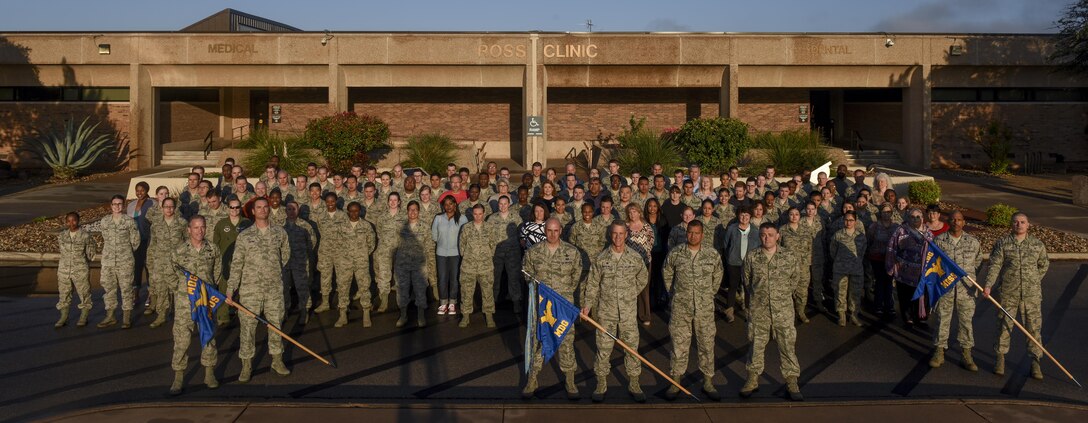 The 17th Medical Group poses for a portrait in front of Ross Clinic on Goodfellow Air Force Base, Texas, April 24, 2016. The 17th MDG won three separate awards for customer satisfaction for 2016. (U.S. Air Force photo by Senior Airman Devin Boyer/ Released)