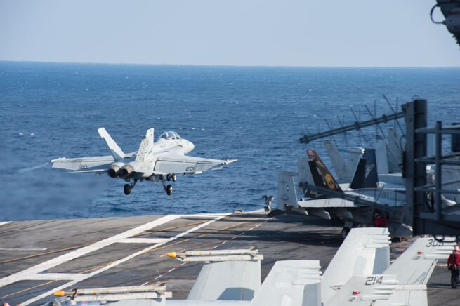 MEDITERRANEAN SEA (Feb. 13, 2017) An F/A-18F Super Hornet assigned to the "Black Lions" of Strike Fighter Squadron (VFA) 213 launches from the aircraft carrier USS George H.W. Bush (CVN 77) in support of Operation Inherent Resolve. The ship's carrier strike group is conducting naval operations in the U.S. 6th Fleet area of operations in support of U.S. national security interests. (U.S. Navy photo by Mass Communication Specialist 3rd Class Danny Ray Nunez Jr./Released)