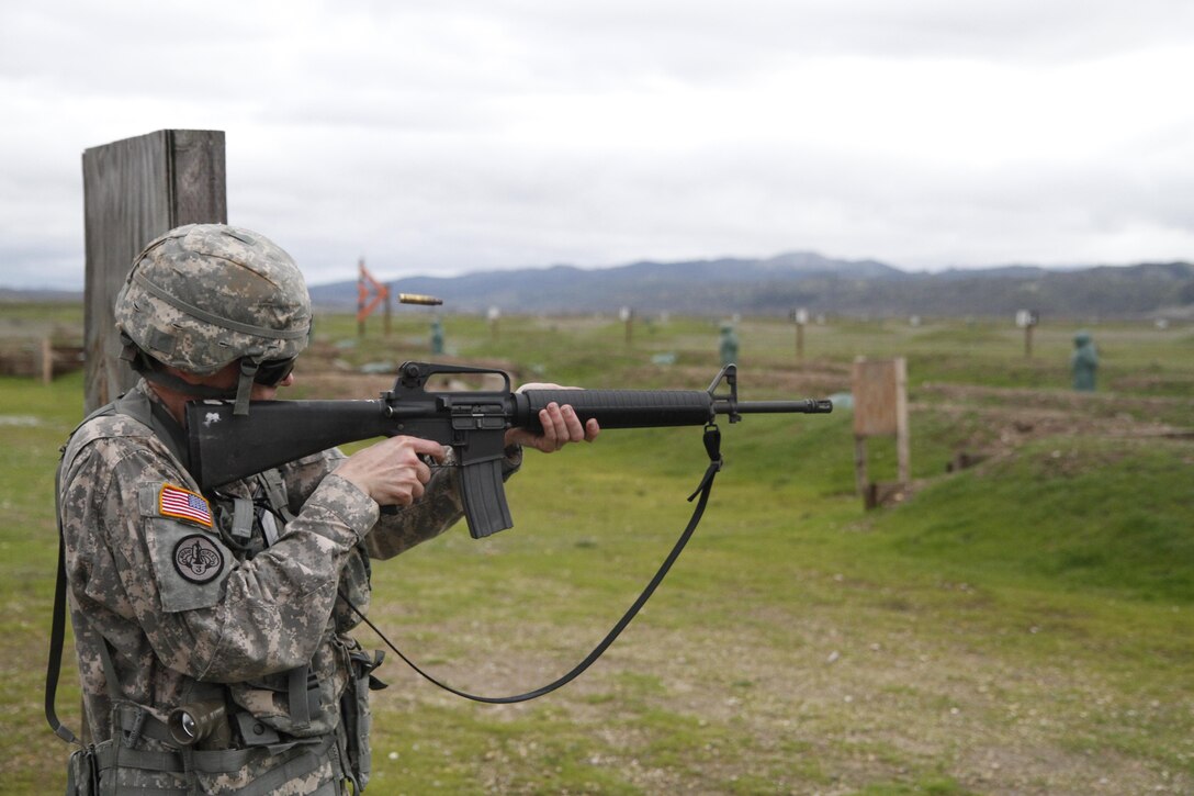 U.S. Army Staff Sgt. Zachary Morin participates in a reflex fire training event during the Best Warrior Competition, Fort Hunter Liggett, Calif. on February 8, 2017. Morin had to use his M16 and 40 rounds for the event.