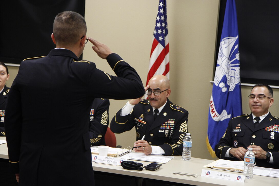 U.S. Army Reserve soldier Pfc. Juan Millan reports to the President of the board CSM Felipe Colón during the Best Warrior Competition, Fort Hunter Liggett Calif. on February 9, 2017. Reporting to the President of the board is the first thing you do when appearing on one. 