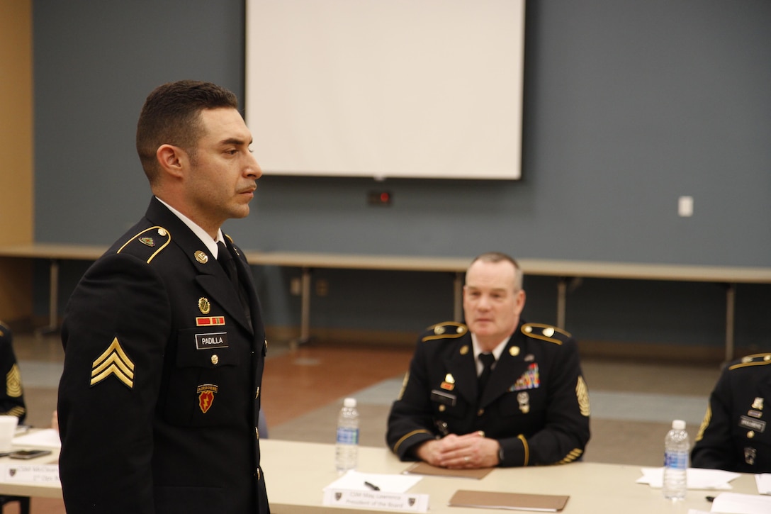 U.S. Army Reserve soldier Sgt. Juan Padilla has his uniform inspected during a board during the Best Warrior Competition Fort Hunter Liggett Calif. on February 9, 2017. Once Padilla had his uniform inspected he was seated and the board began to ask him questions. 