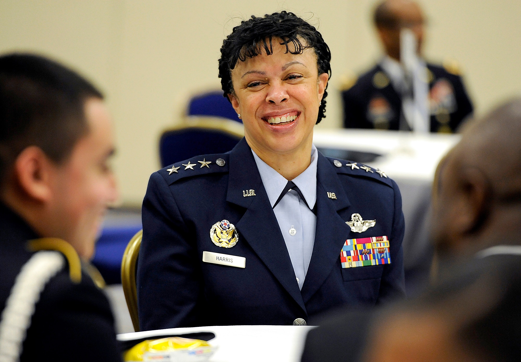 Lt. Gen. Stayce Harris, the Air Force assistant vice chief of staff, mentors high school students during the Black Engineer of the Year Awards Science, Technology, Engineering and Mathematics Conferences' Stars and Stripes ceremony Feb. 10, 2017, in Washington, D.C. (U.S. Air Force photo/Tech. Sgt. Robert Barnett)
