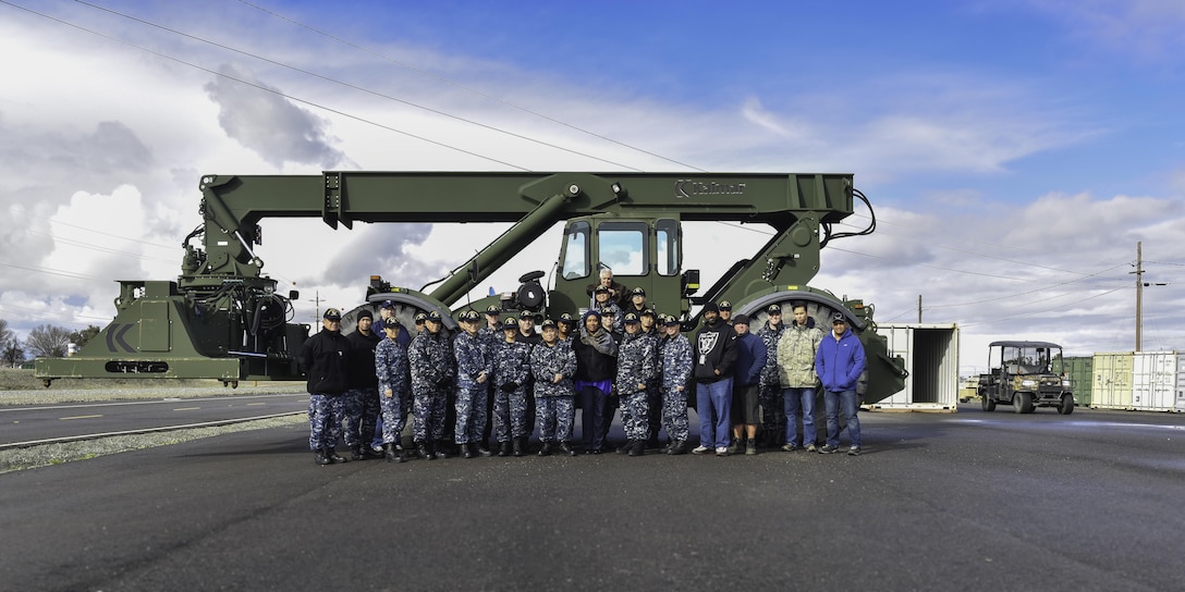 Pictured are the Navy Reservists of DLA Distribution Operations Team San Joaquin with members of the Distribution Expeditionary Logistics and the DDXX team assigned to DLA Distribution San Joaquin. 