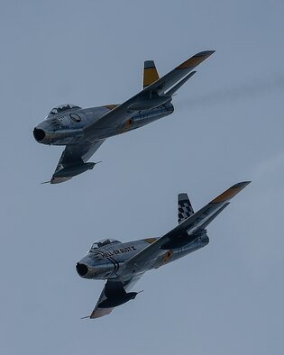 Two F-86 Sabres fly together during the 2017 Heritage Flight Training and Certification Course at Davis-Monthan Air Force Base, Ariz., Feb. 12, 2017. The first production model of the F-86 flew in 1948 and supported the Strategic Air Command from 1949 to 1950. (U.S. Air Force photo by Senior Airman Chris Drzazgowski)