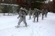 Soldiers with the 181st Multi-Functional Training Brigade participate in a snowshoe skills training session Jan. 26, 2017, at Training Area D-10 as part of the Cold-Weather Operations Course at Fort McCoy. The Cold-Weather Operations Course is the first of its kind coordinated by the Directorate of Plans, Mobilization, Training and Security, or DPTMS. It includes participation by 11 Soldiers with the 181st and is taught by two instructors contracted to support DPTMS. (U.S. Army Photo by Scott T. Sturkol, Public Affairs Office, Fort McCoy)