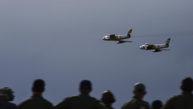 Two F-86 Sabres fly together during the 2017 Heritage Flight Training and Certification Course at Davis-Monthan Air Force Base, Ariz., Feb. 12, 2017. The first production model of the F-86 flew in 1948 and supported the Strategic Air Command from 1949 to 1950. (U.S. Air Force photo by Senior Airman Chris Drzazgowski)