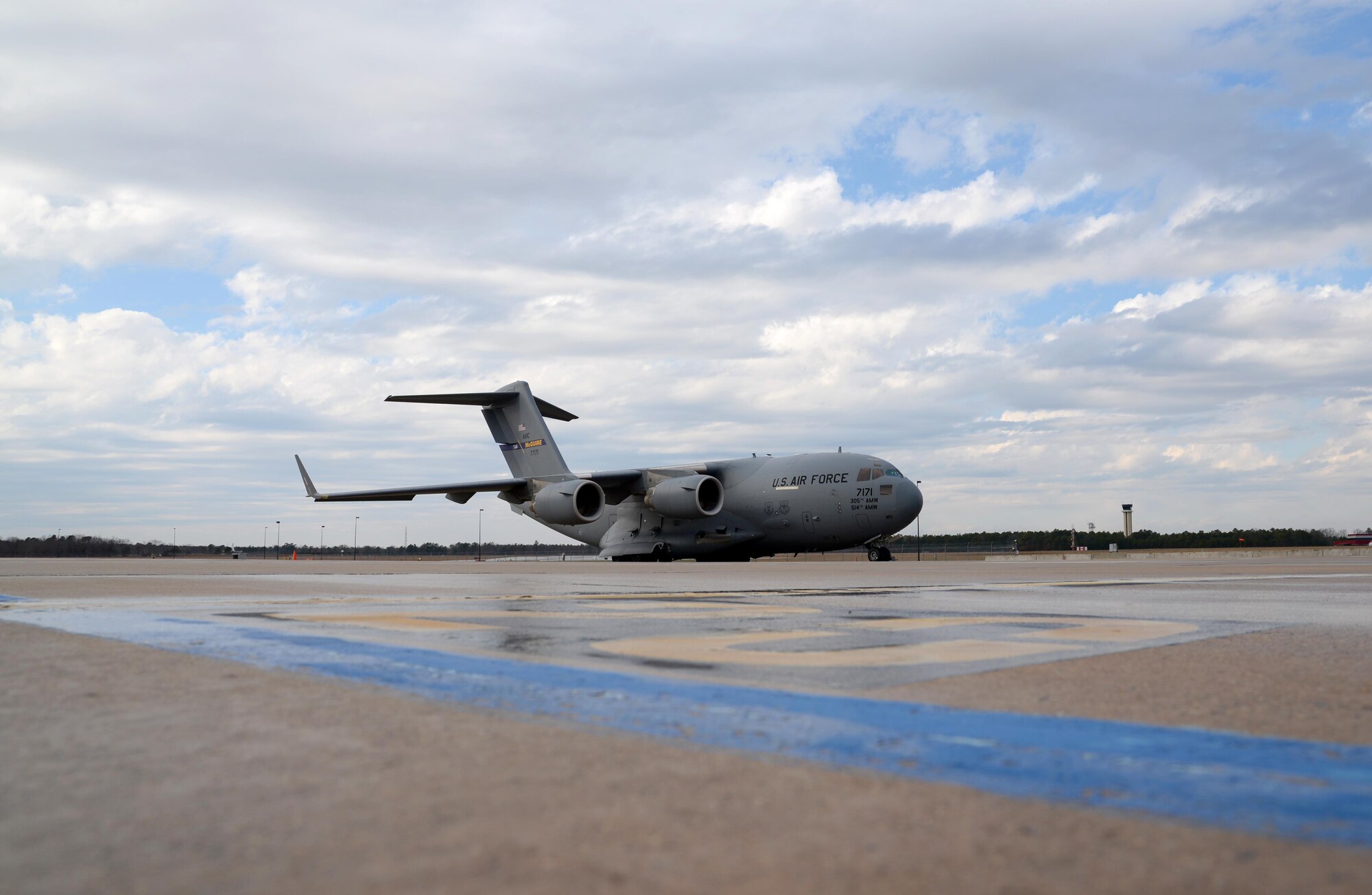 A picture of a U.S. Air Force C-17 Globemaster III from Joint Base McGuire-Dix-Lakehurst, N.J. preparing for takeoff.