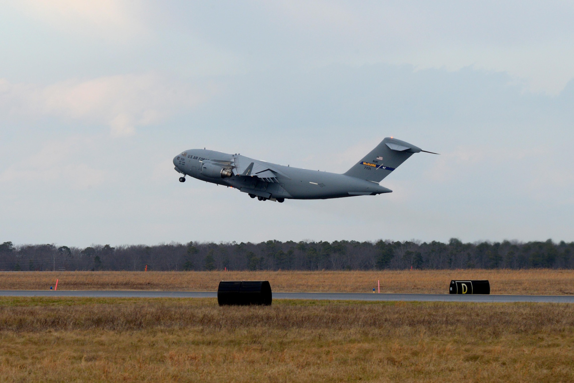 A picture of a U.S. Air Force C-17 Globemaster III lifting off from the runway at the Atlantic City Air National Guard Base, N.J.