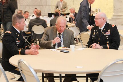 The Utah Defense Alliance hosted another “Meet the Military” breakfast event at the Utah State Capitol Rotunda on January 26.  
The event provided an opportunity for Utah State Legislators to meet and interact with senior leaders from Fort Douglas, Hill Airforce Base, Tooele Army Depot, Dugway Proving Ground, and the Utah Army National Guard.  
The 76th Division Operational Response (OR) Chief of Staff, Col. Doug Cherry (far left), represented Fort Douglas on behalf of 76th Div. OR Commanding General, Maj. Gen. Ricky Waddell.  The 88th Regional Support Command Legislative Liaison, Col. Michael Holland (far right) attended during the event.