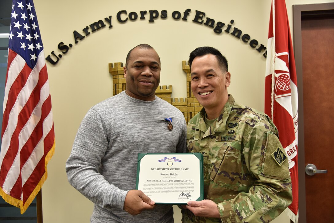 Brig. Gen. Toy presents an award