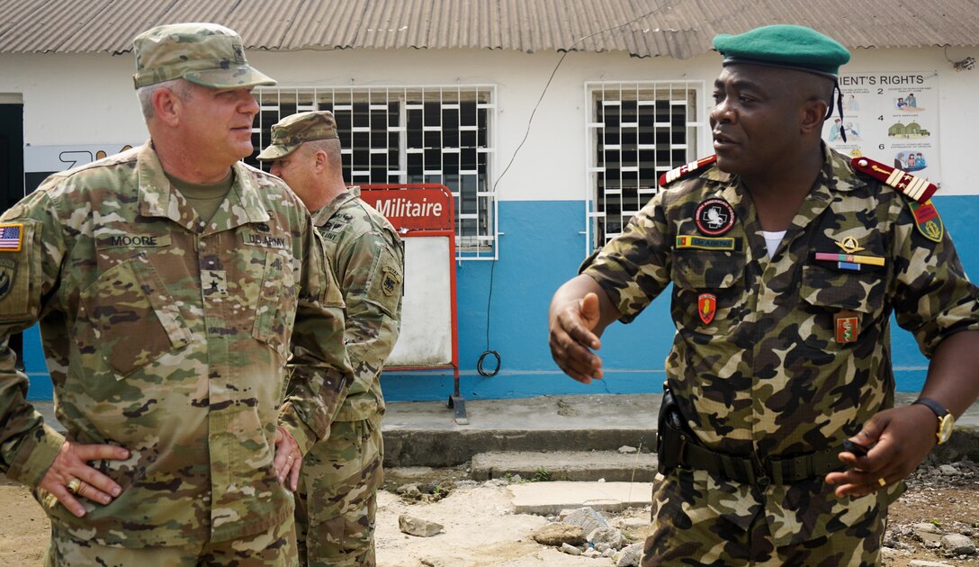 Cameroonian Col. Abeng Mbozo'o, chief of the Region 2 Military Clinic, talks about his hospital staff with U.S. Army Brig. Gen. Kenneth Moore, U.S. Army Africa deputy commanding general and Army Reserve Engagement Cell chief, during a visit to the Hopital Militaire de Douala, Feb. 8, 2017. The hospital has received support from both the U.S. military and nongovernmental organizations and serves the entire military and civilian community of Douala.