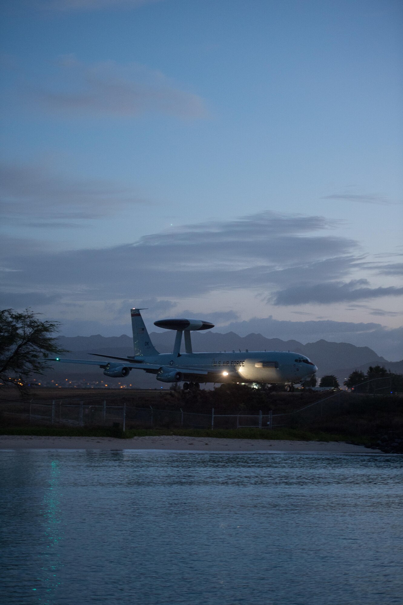 An E-3 Sentry Airborne Warning and Control System aircraft flown by reservists from the 513th Air Control Group taxis for its last of nine missions on Feb. 3 supporting Sentry Aloha 17-01 at Joint Base Pearl Harbor-Hickam, Hawaii. Reservists from the 513th Air Control Group deployed to the Hawaiian Islands to provide command and control for Sentry Aloha 17-01, a primarily Reserve and Air National Guard exercise that involves more than 40 aircraft and 1,000 personnel. (U.S. Air Force photo by 2nd Lt. Caleb Wanzer)