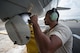 Senior Airman Najee Menefee, a communications and navigation specialist from the 513th Aircraft Maintenance Squadron, hooks up a forced air hose to an E-3 Sentry Airborne Warning and Control System aircraft on Feb. 4 at Joint Base Pearl Harbor-Hickam, Hawaii. Reservists from the 513th Air Control Group deployed to the Hawaiian Islands to provide command and control for Sentry Aloha 17-01, a primarily Reserve and Air National Guard exercise that involves more than 40 aircraft and 1,000 personnel. (U.S. Air Force photo by 2nd Lt. Caleb Wanzer)