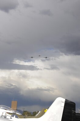 Two U.S. Air Force A-10C Thunderbolt IIs and a P-47 Thunderbolt fly in formation above historic aircraft during the 2017 Heritage Flight Training and Certification Course at Davis-Monthan Air Force Base, Ariz., Feb. 12, 2017. During the course, aircrews practiced ground and flight training to enable civilian pilots of historic military aircraft and U.S. Air Force pilots of current fighter aircraft to safely fly in formations together. (U.S. Air Force Photo by Airman 1st Class Nathan H. Barbour)
