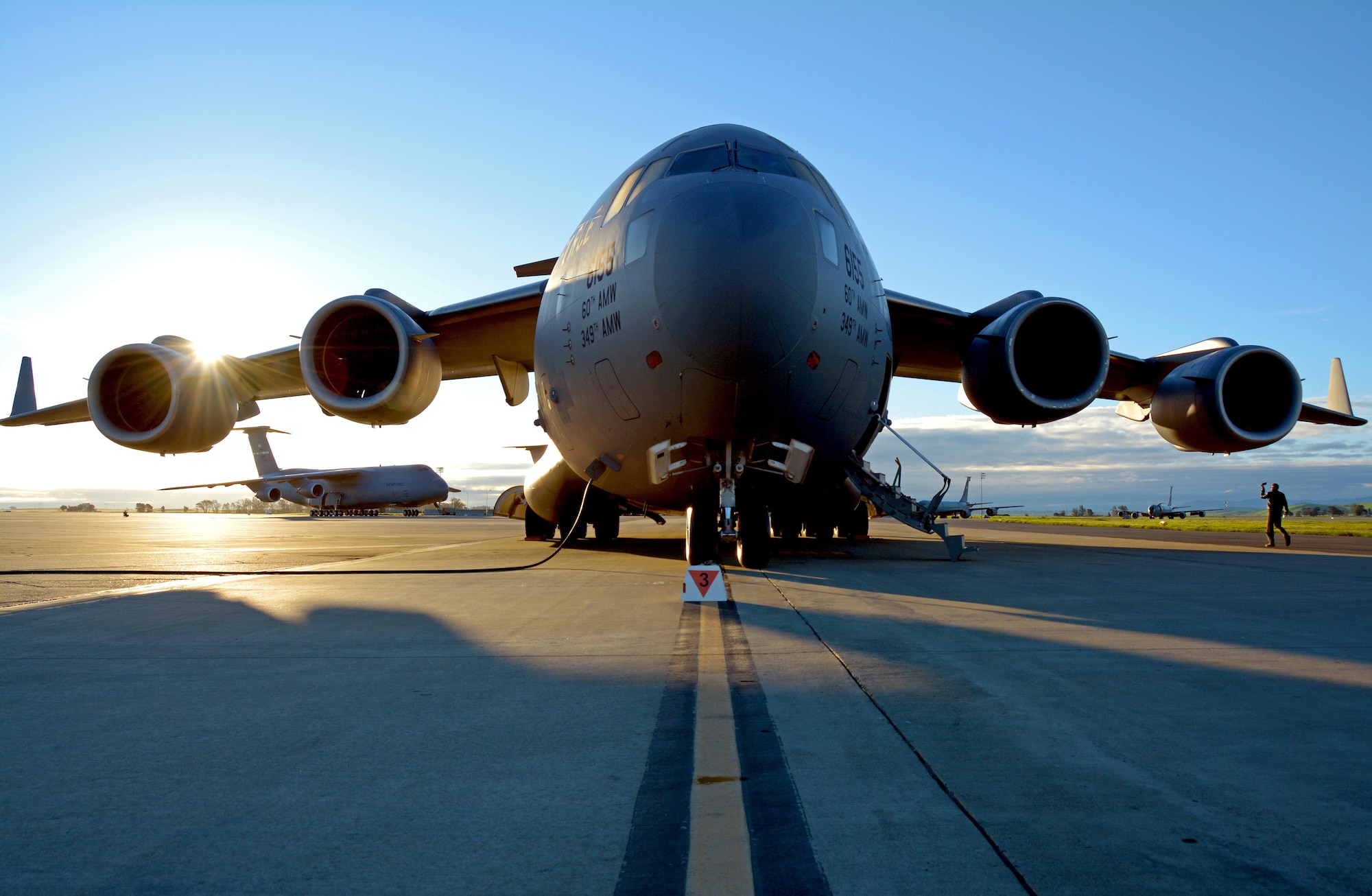 A Citizen Airman assigned to the 301st Airlift Squadron inspects a C-17 Globemaster III prior to take off for Patriot Wyvern during the February drill weekend at Travis Air Force Base, Calif., on Feb. 11, 2017. Patriot Wyvern is a hands-on, bi-annual event conducted by the 349th Air Mobility Wing designed to hone combat skills and improve organizational interoperability. (U.S. Air Force photo/Staff Sgt. Daniel Phelps)