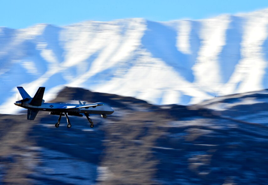 An MQ-9 Reaper flies during a training mission Jan. 28, 2016, at Creech Air Force Base, Nev. The MQ-9 integrated with the F-35A Lightning II during Red Flag 17-1 for the first time. (U.S. Air Force photo by Senior Airman Christian Clausen/Released)