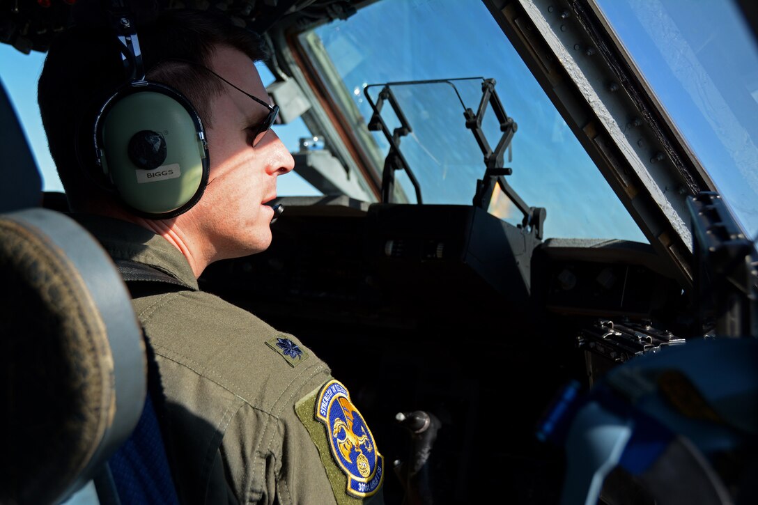 Lt. Col. Jason Biggs, 301st Airlift Squadron C-17 Globemaster III pilot, scans the sky during Patriot Wyvern, Travis Air Force Base, Calif., on Feb. 11, 2017. Patriot Wyvern is a hands-on, bi-annual event conducted by the 349th Air Mobility Wing designed to hone combat skills and improve organizational interoperability. (U.S. Air Force photo/Staff Sgt. Daniel Phelps)