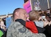 Tech. Sgt. Narley Wright, a weapons expediter assigned to the 28th Aircraft Maintenance Squadron, reunites with his family at Ellsworth Air Force Base, S.D., Feb. 12, 2017. Approximately 300 Ellsworth Airmen deployed to Andersen Air Force Base, Guam, as part of the U.S. Pacific Command’s Continuous Bomber Presence mission. (U.S. Air Force photo by Airman 1st Class Donald C. Knechtel)