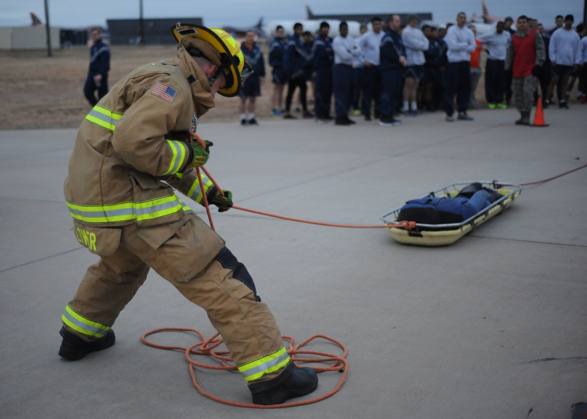 Senior Airman Gavin Flower, a 7th Civil Engineer Squadron firefighter, participates in a basket drag during the remembrance muster in honor of Dyess’ fallen firefighter, Staff Sgt. Ray Rangel, Feb. 13, 2017, at Dyess Air Force Base, Texas. Rangel was a firefighter assigned to the 7th CES at Dyess, who died while attempting to rescue two soldiers trapped in a Humvee that overturned in a canal outside of Balad Air Base, Iraq, Feb. 13, 2005. (U.S. Air Force photo by Airman 1st Class Emily Copeland)