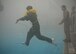 A Survival School student leaps toward a simulated rescue helicopter for rescue during a training session Feb. 10, 2017, at Fairchild Air Force Base, Wash. The fitness center pool was not originally designed with water survival training in mind, but was adapted to service training needs. (U.S. Air Force photo/ Airman 1st Class Ryan Lackey)