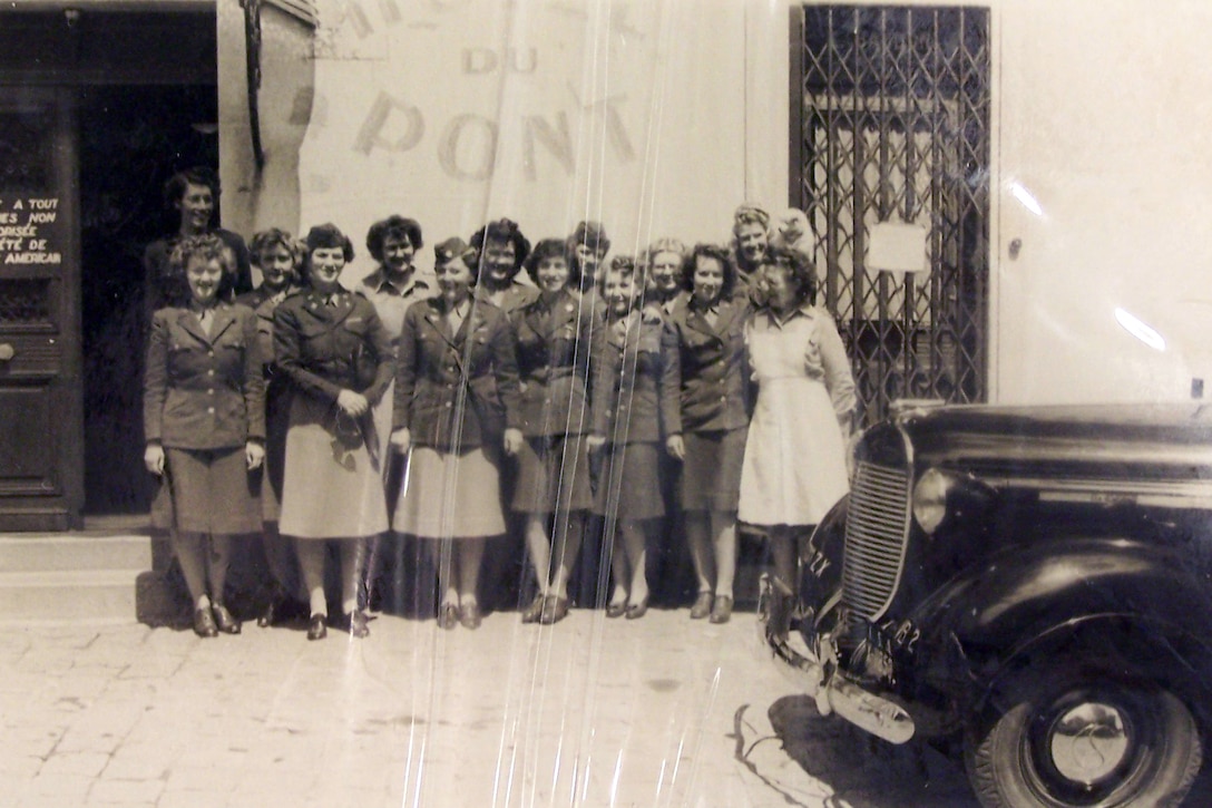 Army Capt. Smitty McClellan poses with a group of the Women's Army Corps unit she led during World War II