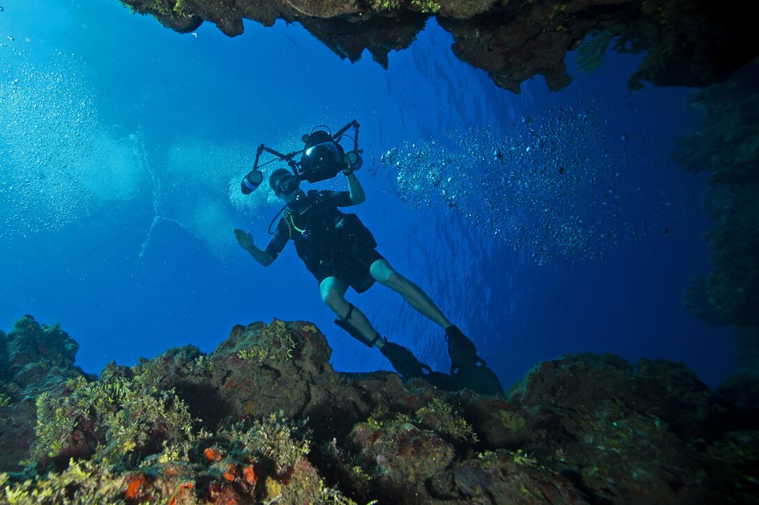 Navy Petty Officer 2nd Class Austin Simmons conducts annual underwater photography training off the coast of Naval Station Guantanamo Bay, Cuba, Feb. 8, 2017. Simmons is assigned to Expeditionary Combat Camera. Navy photo by Petty Officer 1st Class Blake Midnight