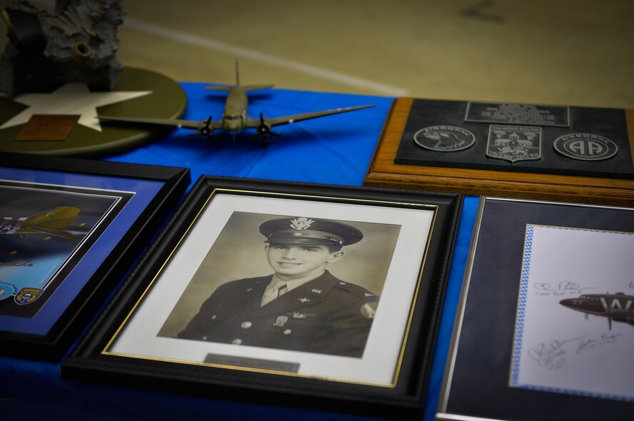 37th Airlift Squadron memorabilia lies on a table at Ramstein Air Base, Germany, Feb. 10, 2017, during the squadron's 75th Anniversary celebration at Ramstein Air Base, Germany, Feb. 10, 2017. The 37th AS was established on Feb. 2, 1942, and activated as a unit on Feb. 14 that same year. (U.S. Air Force photo by Airman 1st Class Joshua Magbanua)