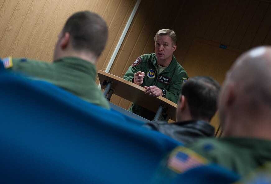 Maj. Alex Adams, 37th Airlift Squadron/86th Operations Group flight chief, briefs a group of pilots about to take to the skies during the 37th AS’s 75th anniversary on Ramstein Air Base, Germany, Feb. 10, 2017. Activated in February 1942, the 37th AS was founded under the First Air Force at Patterson Field, Ohio. The unit trained in the southeastern U.S. before participating in its first assignment in Egypt of November 1942 as part of President Franklin D. Roosevelt’s decision to aid the Royal Air Force Western Desert Air Force during World War II. (U.S. Air Force photo by Senior Airman Lane T. Plummer)