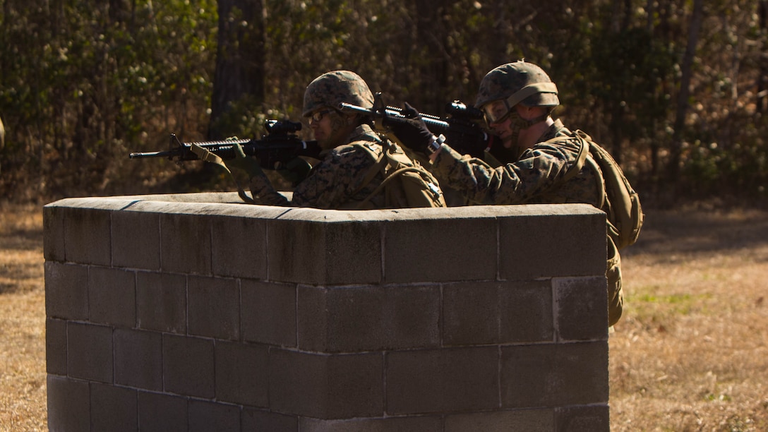 Marines with 2nd Law Enforcement Battalion participate in a grenade assault course at Marine Corps Base Camp Lejeune, North Carolina, Feb. 9, 2017. During the course, Marines used the buddy rush tactic, which consists of Marines communicating to one another and providing notional suppressive fire to an enemy mortar position. Once the Marines reach the end of the course, they prepare a dummy grenade to eliminate the simulated enemy position. 