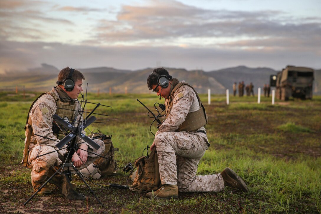 Marines employ field communications equipment during an interoperability and range exercise at Camp Pendleton, Calif., Feb. 3, 2017. The Marines are radio operators assigned to 15th Marine Expeditionary Unit Maritime Raid Force. Marine Corps photo by Cpl. Timothy Valero