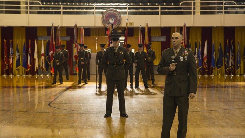 Major Gen. John K. Love stands in front of the 2nd Marine Division’s color guard at a battle colors rededication ceremony for 2nd MarDiv at Camp Lejeune, N.C., Feb. 10, 2017. The ceremony was a passing of legacy from generation to generation in which Marine veterans from different eras of American conflicts awarded streamers to the 2nd MarDiv’s colors.
