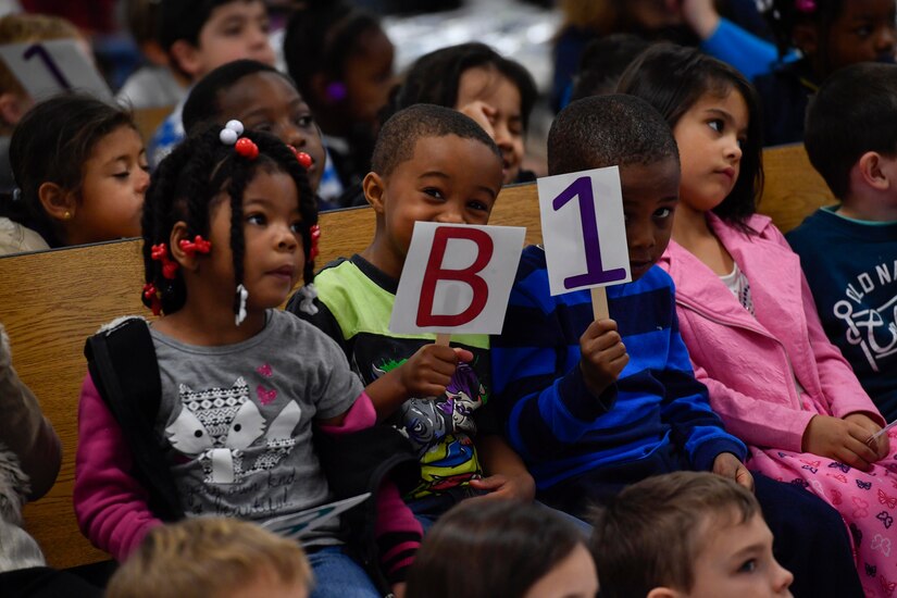 Students from Marrington Elementary School hold up signs to answer questions about dental hygiene during a 628th Medical Group Dental Clinic outreach event for National Children’s Dental Health Month at Marrington Elementary School, Feb. 10, 2017. Establishing a good dental routine and going to the dentist regularly at an early age can help children develop life-long habits for healthy teeth and gums. The dental clinic will reach out to the Child Development Center, youth center and other schools throughout the month of February to educate children on dental health.