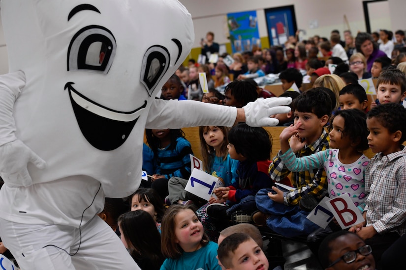 Students from Marrington Elementary School meet with members of the 628th Medical Group Dental Clinic during a National Children’s Dental Health Month outreach event at Marrington Elementary School, Feb. 10, 2017. Establishing a good dental routine and going to the dentist regularly at an early age can help children develop life-long habits for healthy teeth and gums. The dental clinic will reach out to the Child Development Center, youth center and other schools throughout the month of February to educate children on dental health.