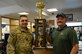 U.S. Air Force Master Sgt. Richard McBride, 25th Intelligence Squadron, Det. 2 flight chief, left, and Ricky Hoover, 25th IS, Det. 2 avionics technician, take home the Military Saves Scotch Bowling Tournament trophy, Feb. 13, 2017, at the bowling center on RAF Mildenhall, England. About 20 two-person teams competed in the free tournament. The event was hosted by the Airman and Family Readiness Center to promote Military Saves Week at both RAF Mildenhall and RAF Lakenheath. (U.S. Air Force photo by Senior Airman Justine Rho)