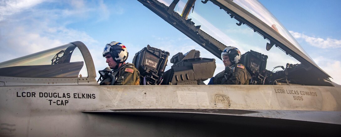 Navy Lt. Cmdr. Lucas Edwards, left, and Lt. Michael Bellavia perform final checks on an F/A-18F Super Hornet aircraft before flight operations on the flight deck aboard the aircraft carrier USS Carl Vinson in the Pacific Ocean, Feb. 7, 2017. Edwards and Bellavia are pilots assigned to Strike Fighter Squadron 2. Navy photo by Petty Officer 2nd Class Sean M. Castellano