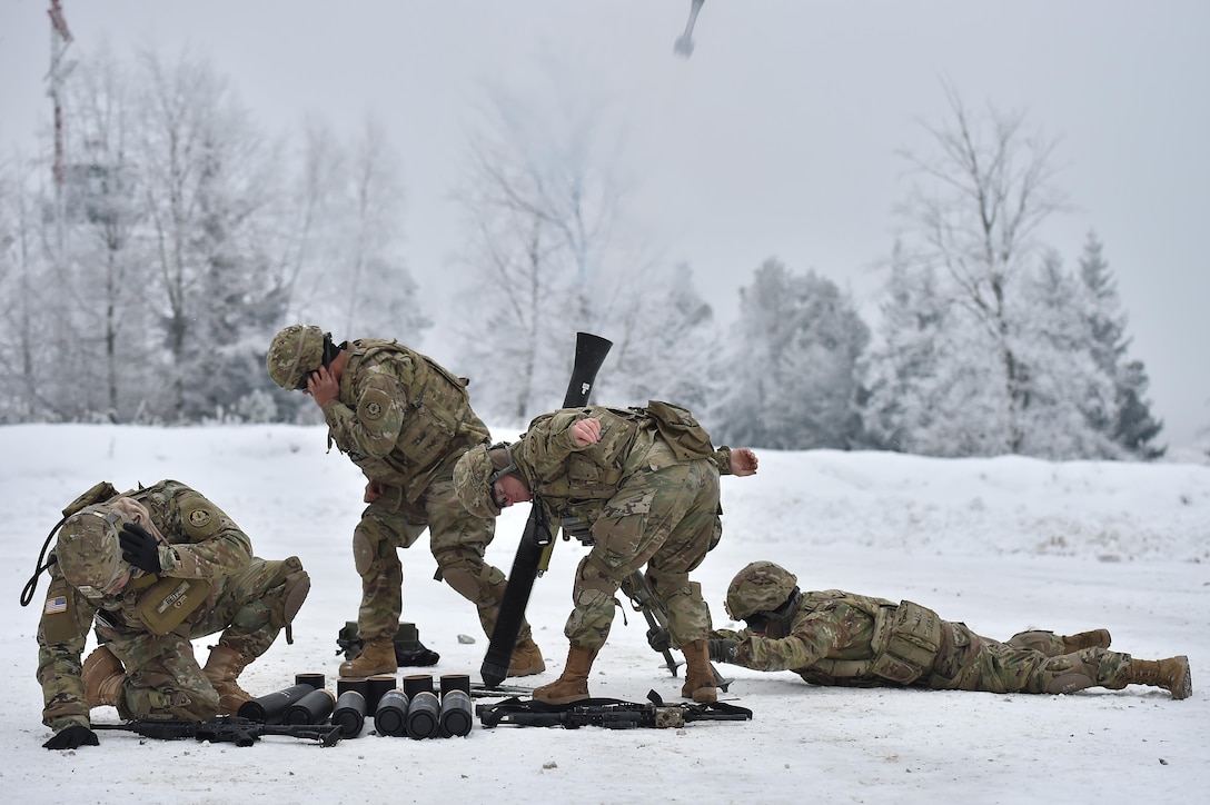 Soldiers conduct a mortar live fire exercise at the 7th Army Training Command’s Grafenwoehr Training Area in Germany, Jan. 24, 2017. The soldiers are assigned to Headquarter and Headquarters Troop, 1st Squadron, 2nd Cavalry Regiment and were training to support Operation Atlantic Resolve later this year. Atlantic Resolve improves interoperability, strengthens relationships and trust among allied armies, contributes to regional stability, and demonstrates U.S. commitment to NATO. Army photo by Gertrud Zach